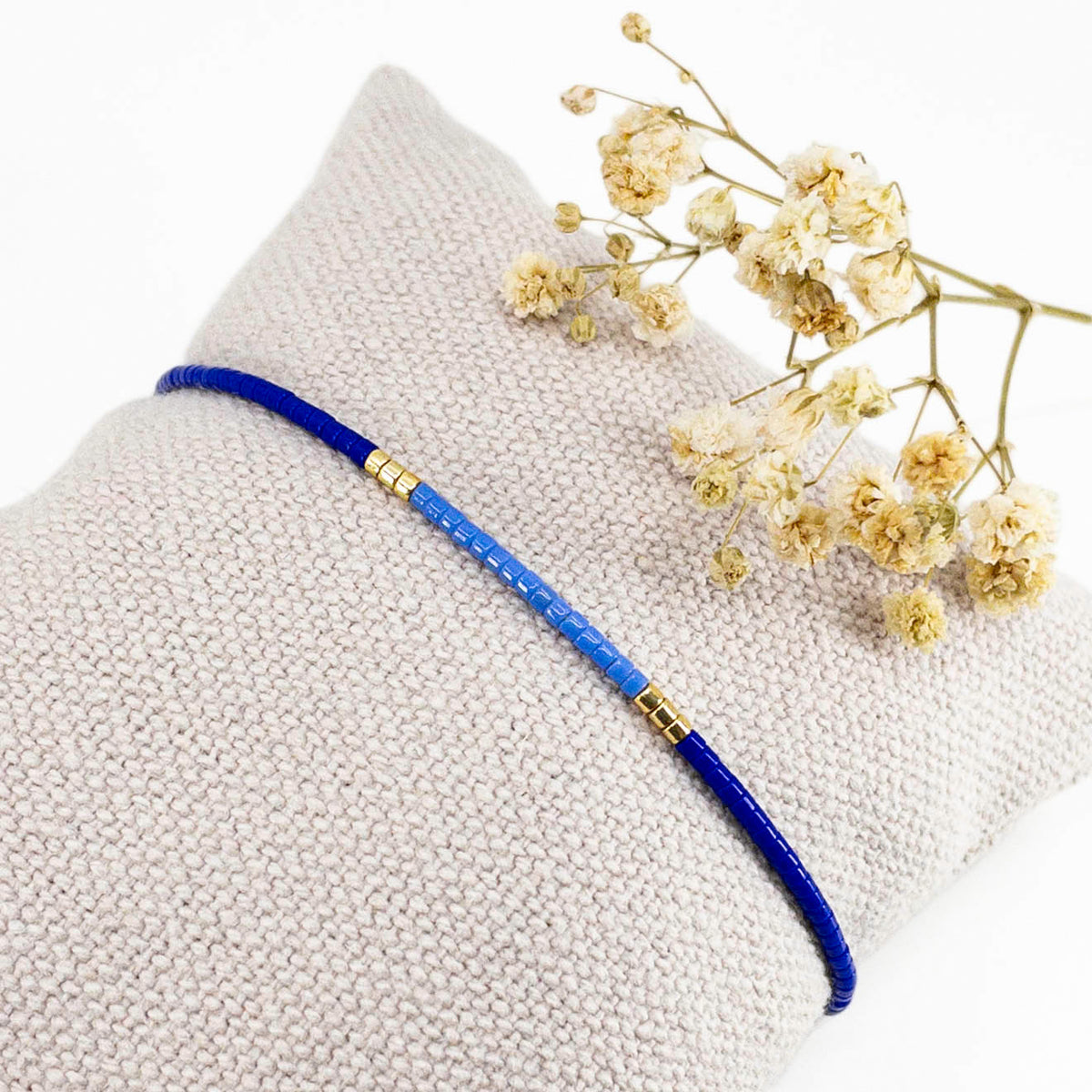 Bracelet en perles de rocaille colorées et or