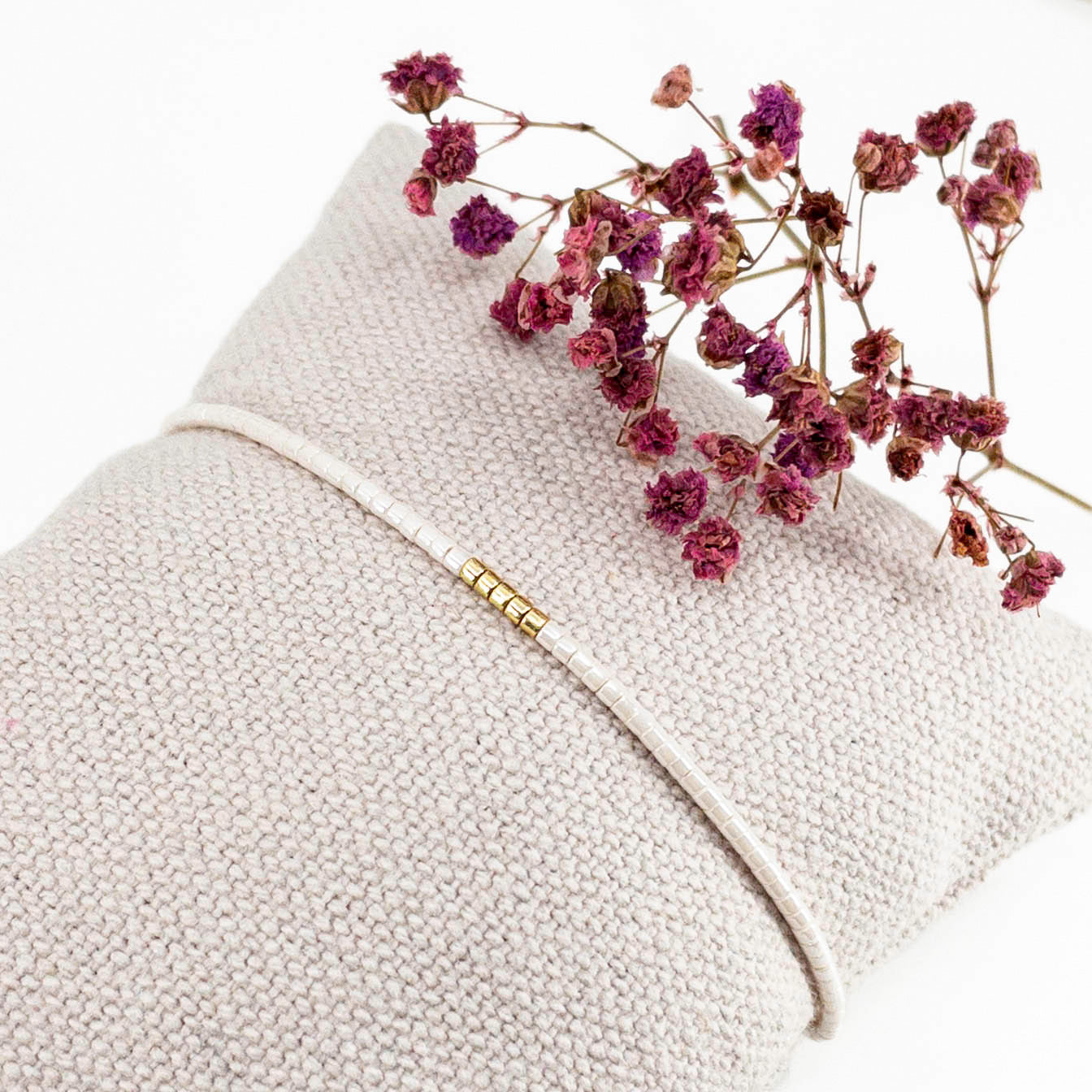 Bracelet en perles de rocaille ivoire et or