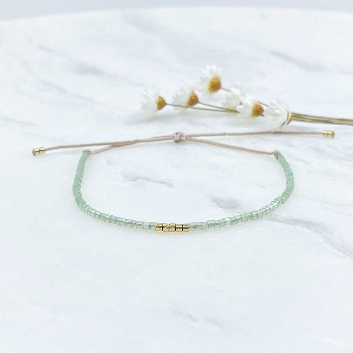 Bracelet en perles de rocaille vert nude