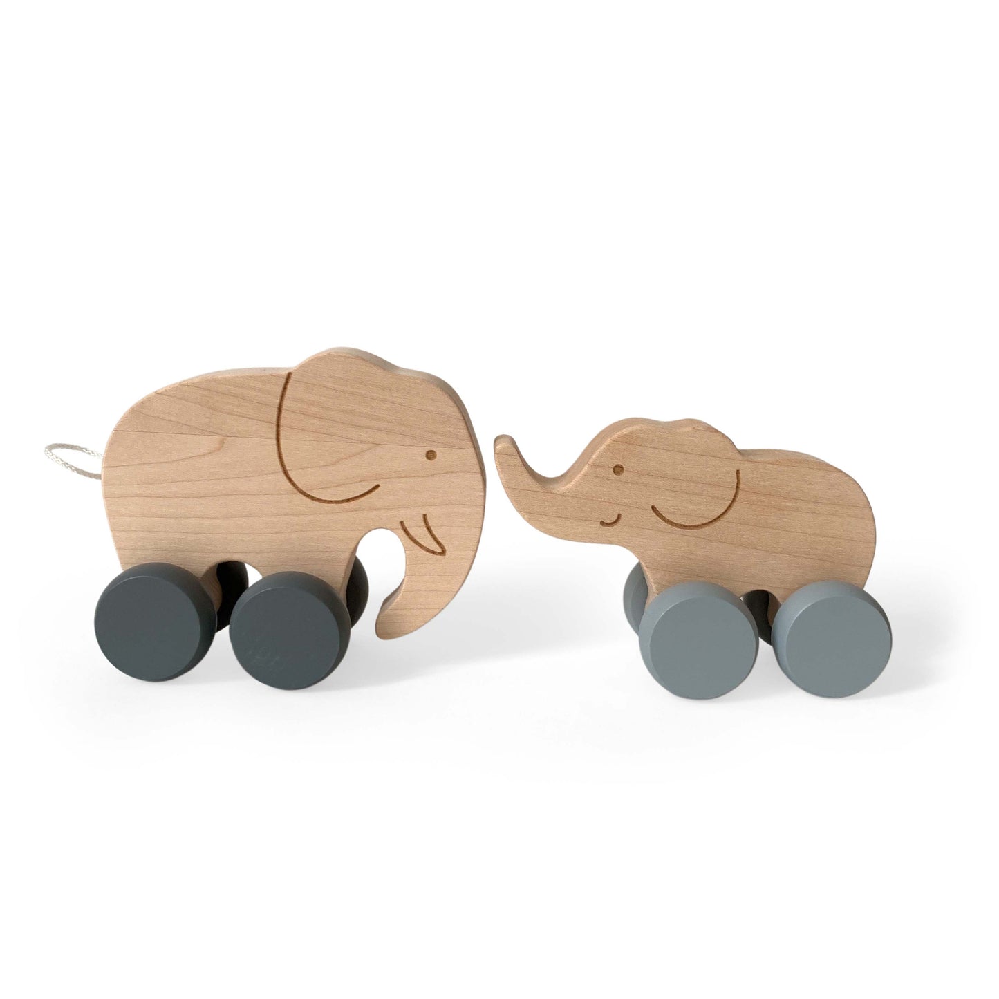 Jouet en bois à pousser composé d'une maman éléphant et de son petit. A partir d'un an.