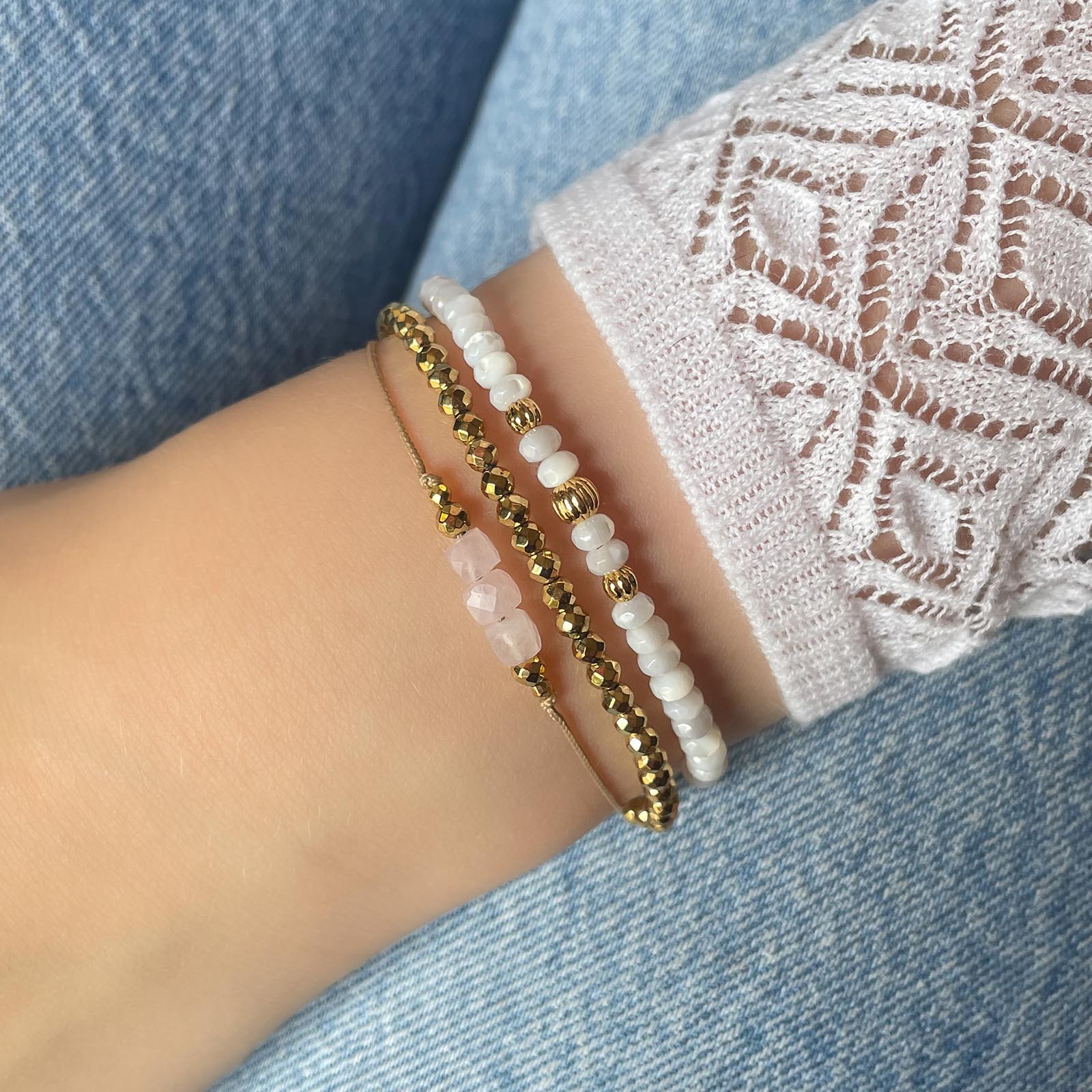 Bracelet ajustable en perles facettées d'hématite dorées