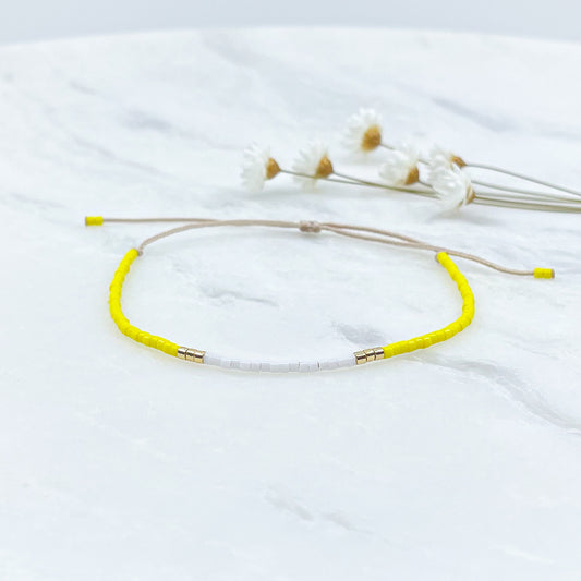 Bracelet en perles de rocaille colorées et or