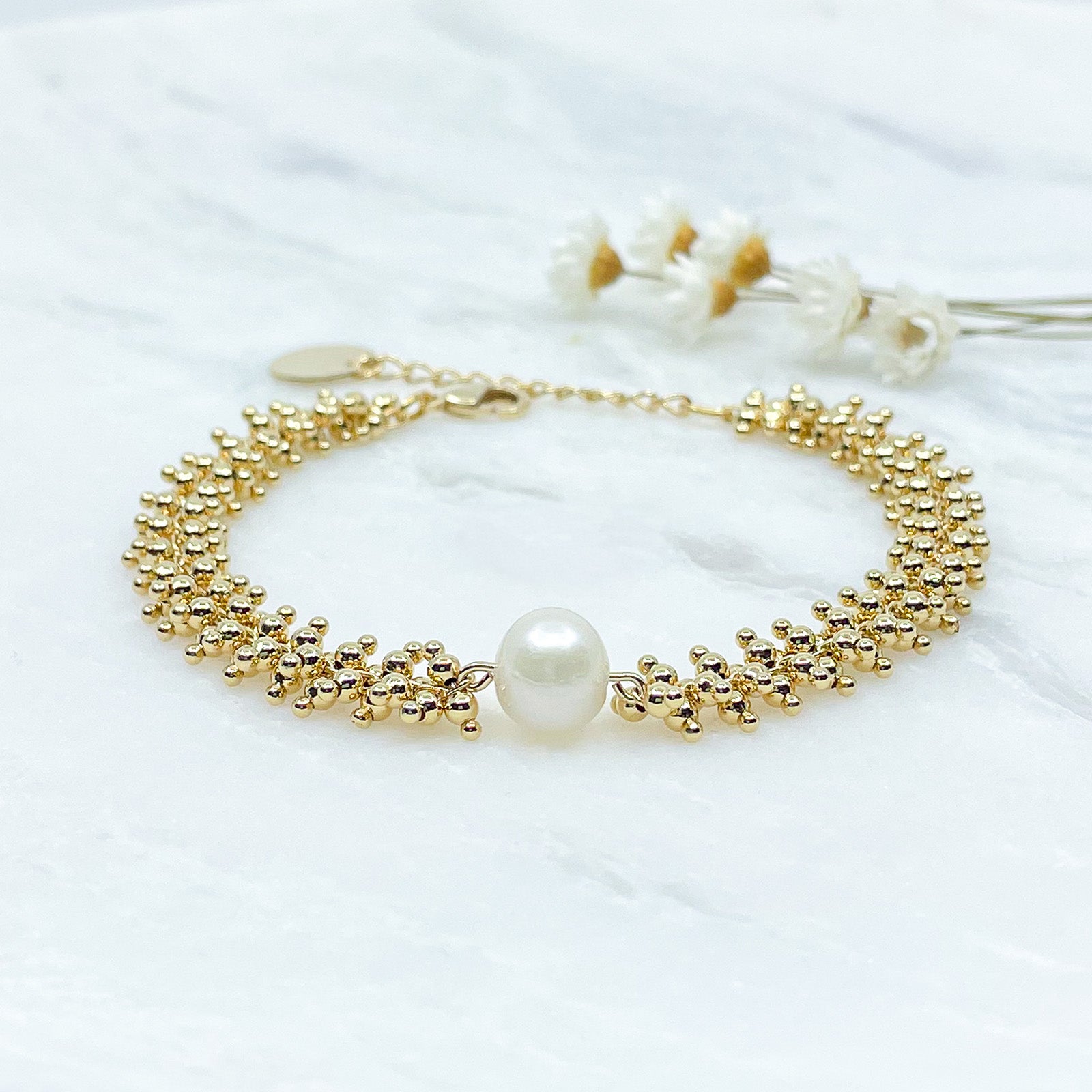 Bracelet mille perles or et perles de culture blanche